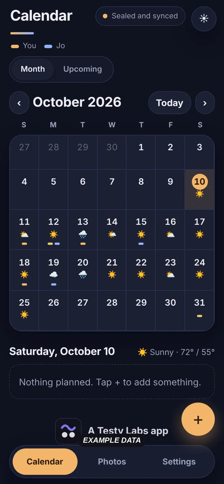 Our Calendar, month view with a weather icon on each day and coloured marks for each person's events